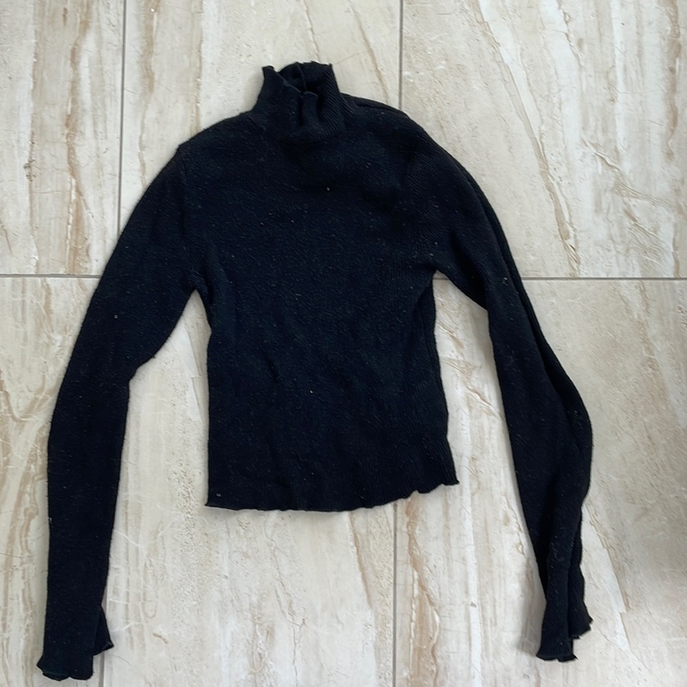 Black turtle neck sweater with little bell sleeves